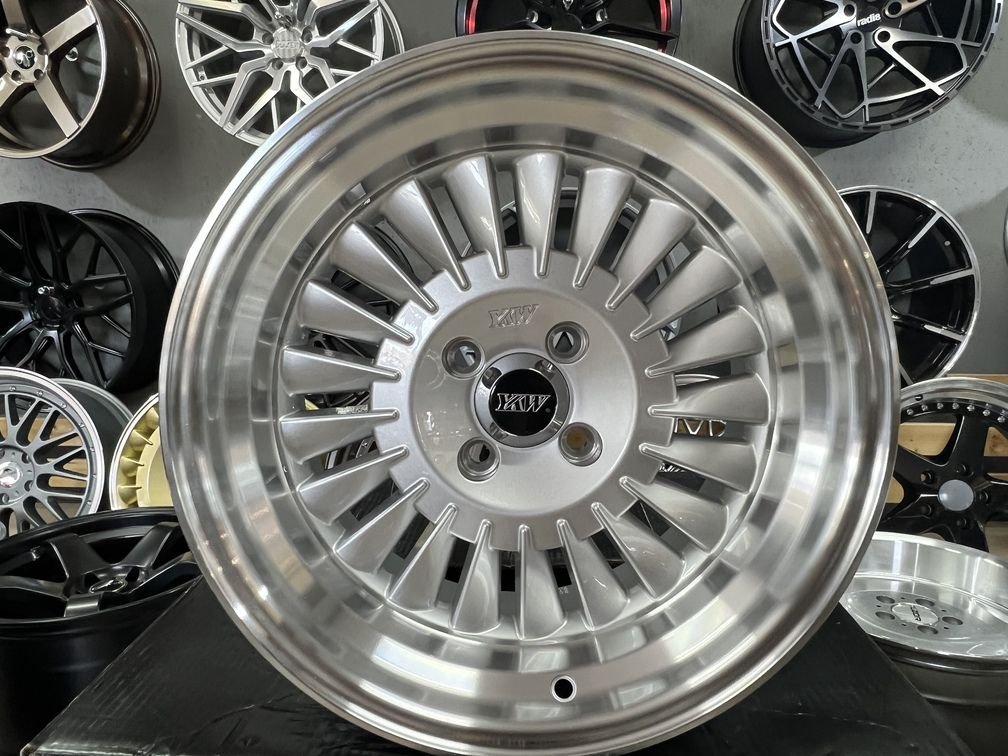 CRX Turbine style 15X8.25J 4X100 ET0 73.1 Silver with polished lip 4